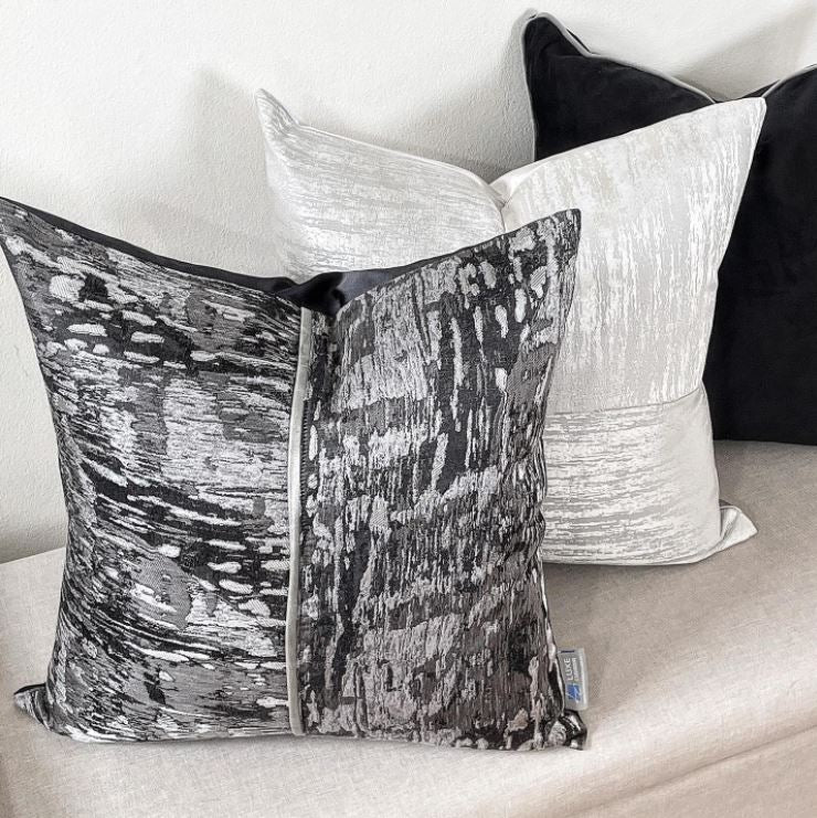 Set of black and silver cushions