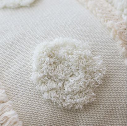 boho cushion with tuft circles