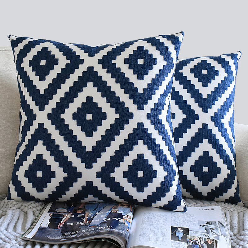 Navy embroided cushions