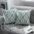 Embroided green patterns cushion