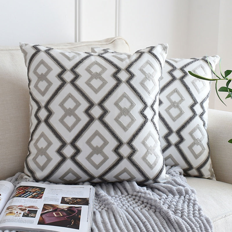 Embroided grey light and dark cushion